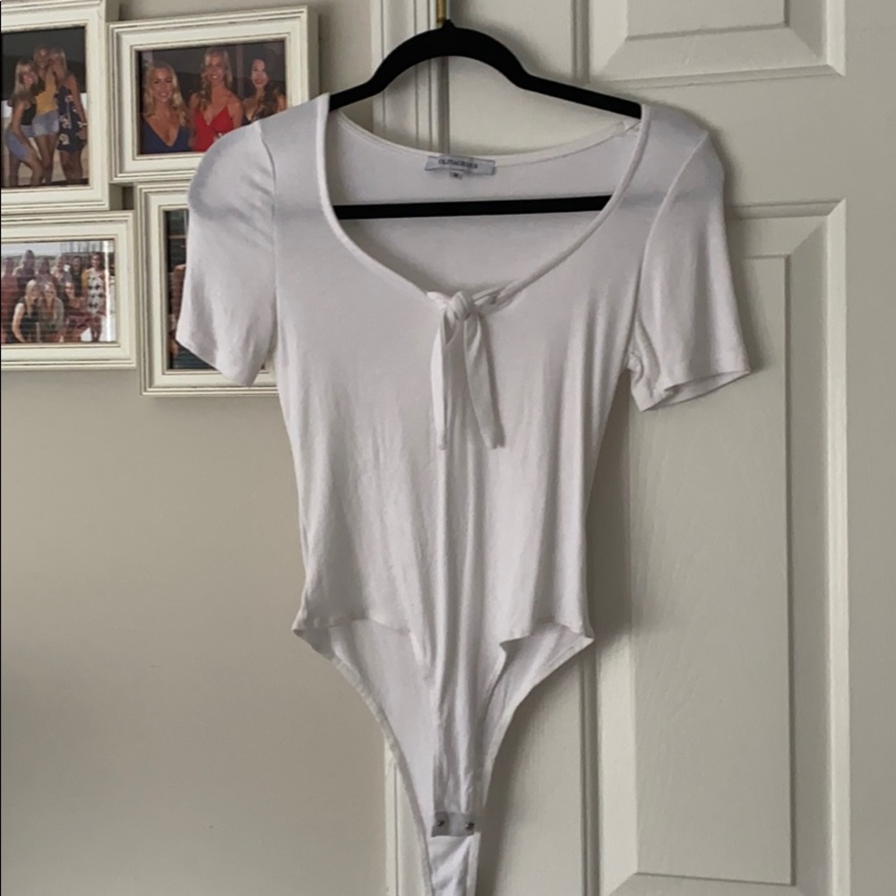 White short sleeved body suit